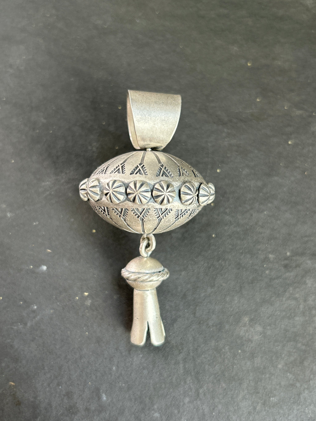 The Sterling Silver Gyrating Tushí Blossom Pendant