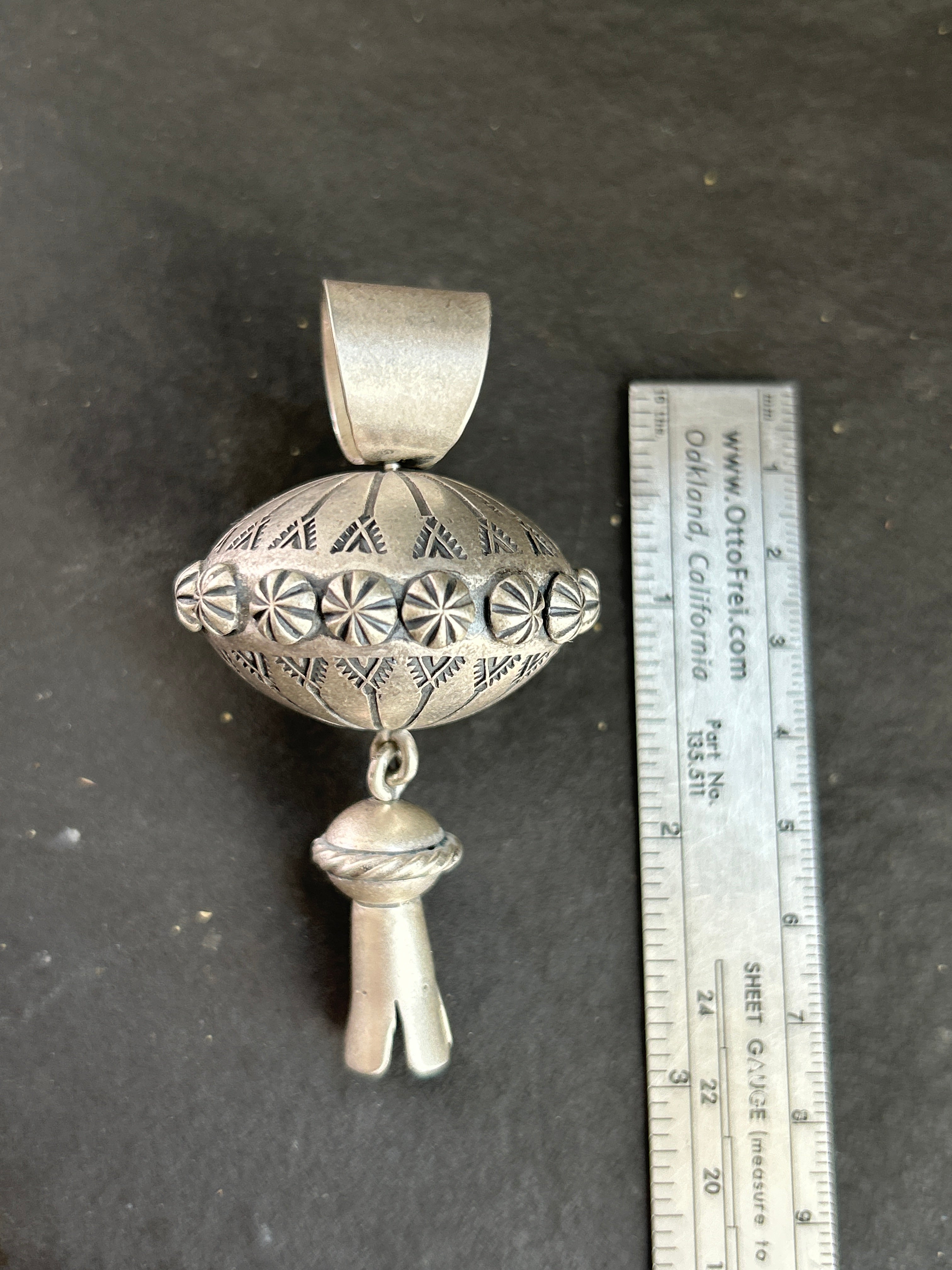The Sterling Silver Gyrating Tushí Blossom Pendant