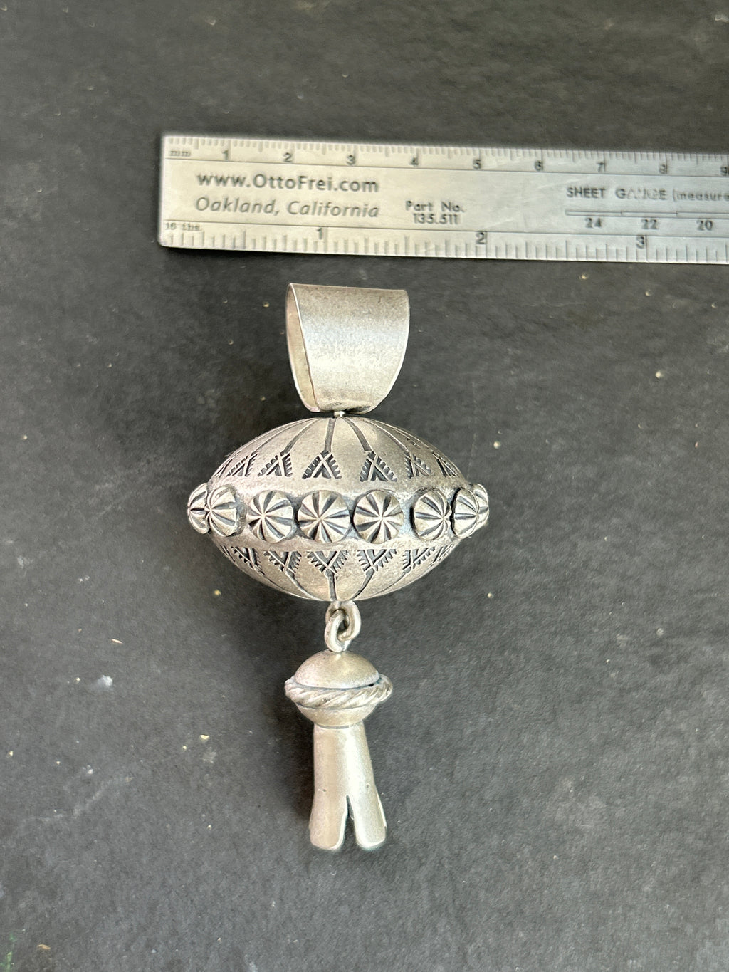The Sterling Silver Gyrating Tushí Blossom Pendant
