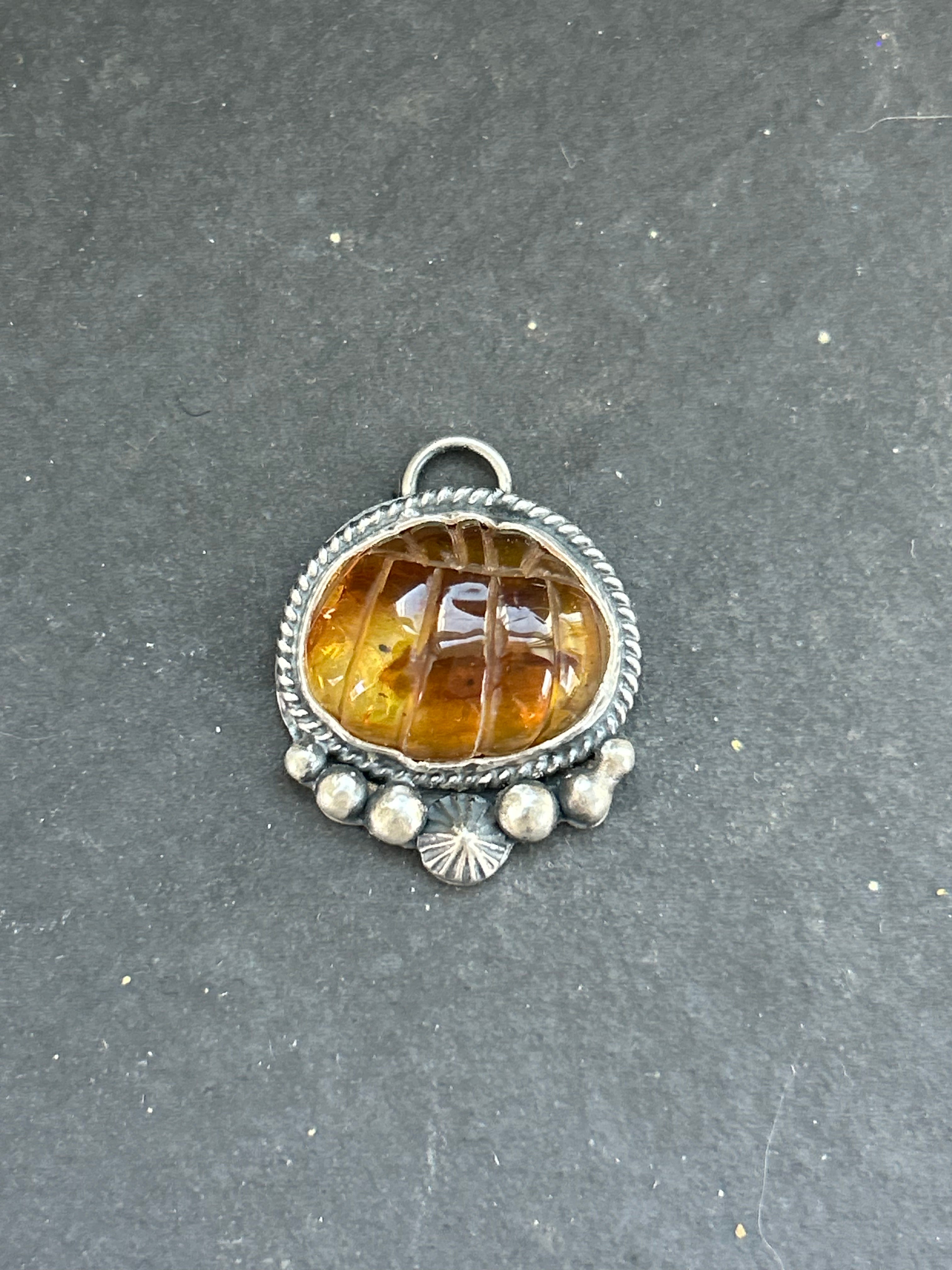 Item #23 Baltic Amber Carved Pumpkin Charm