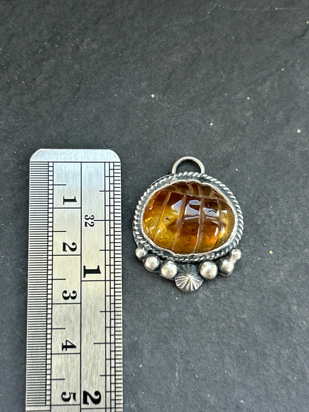 Item #23 Baltic Amber Carved Pumpkin Charm