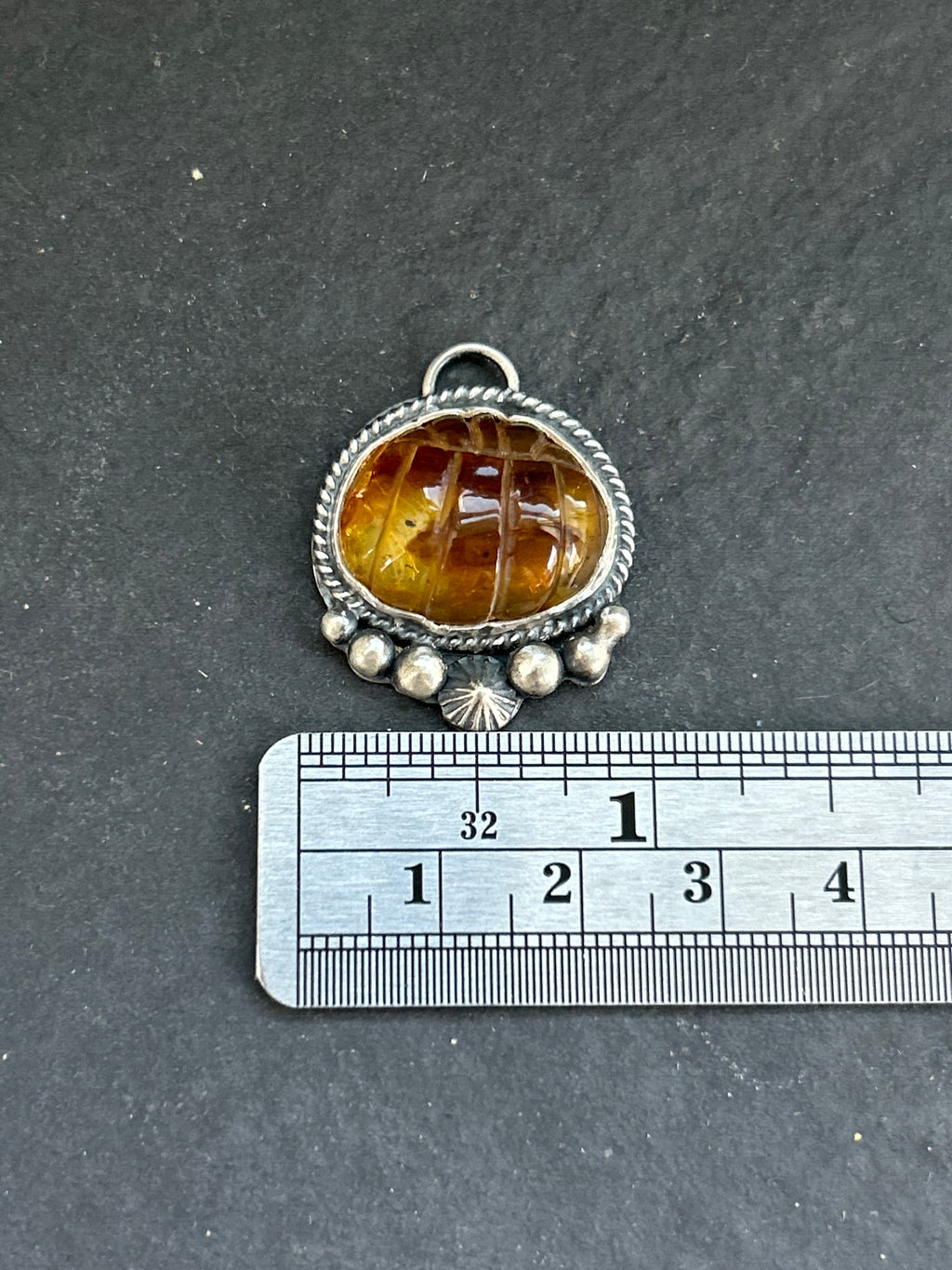 Item #23 Baltic Amber Carved Pumpkin Charm