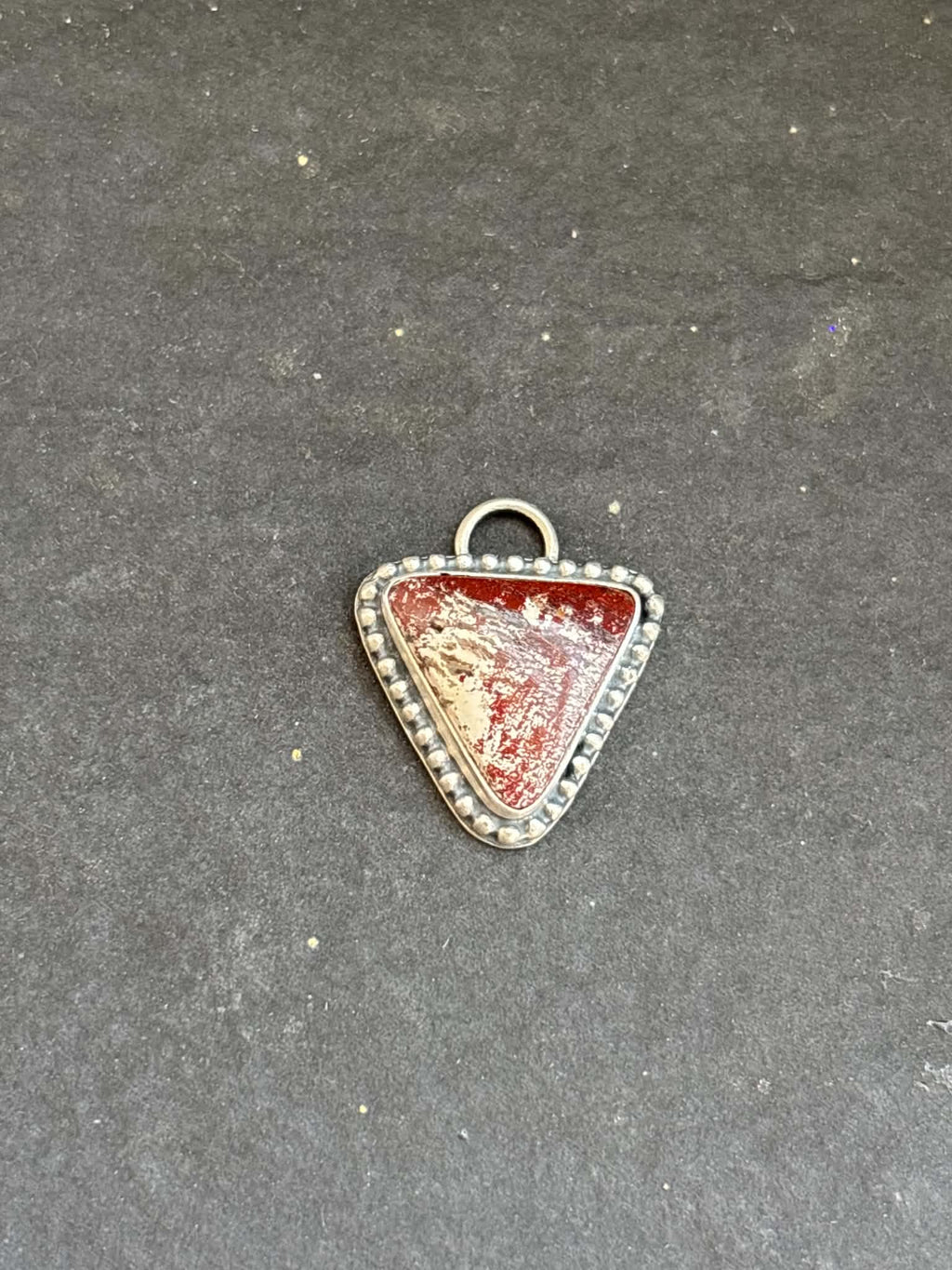 58. Red Buffalo Charm
