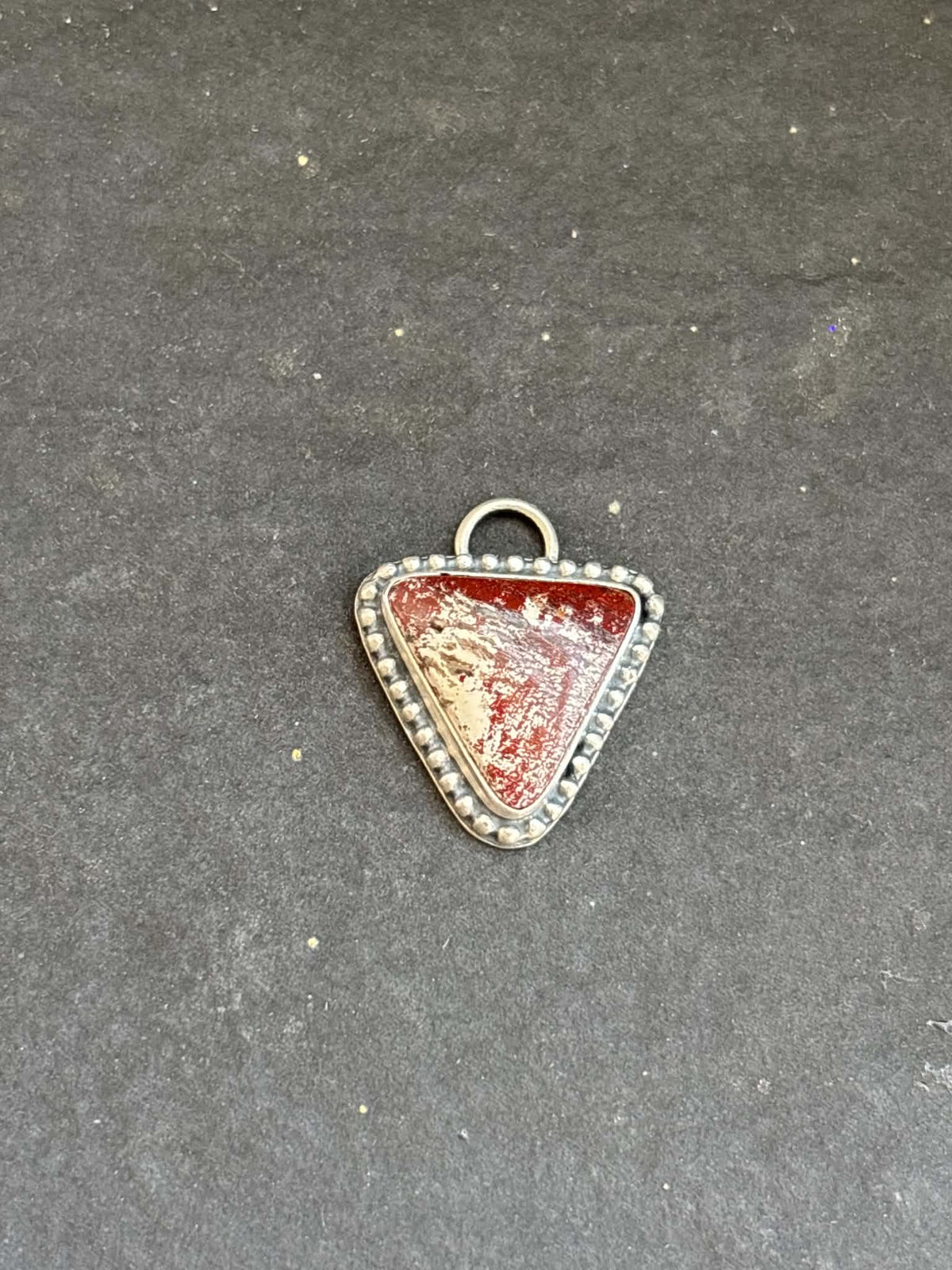 58. Red Buffalo Charm