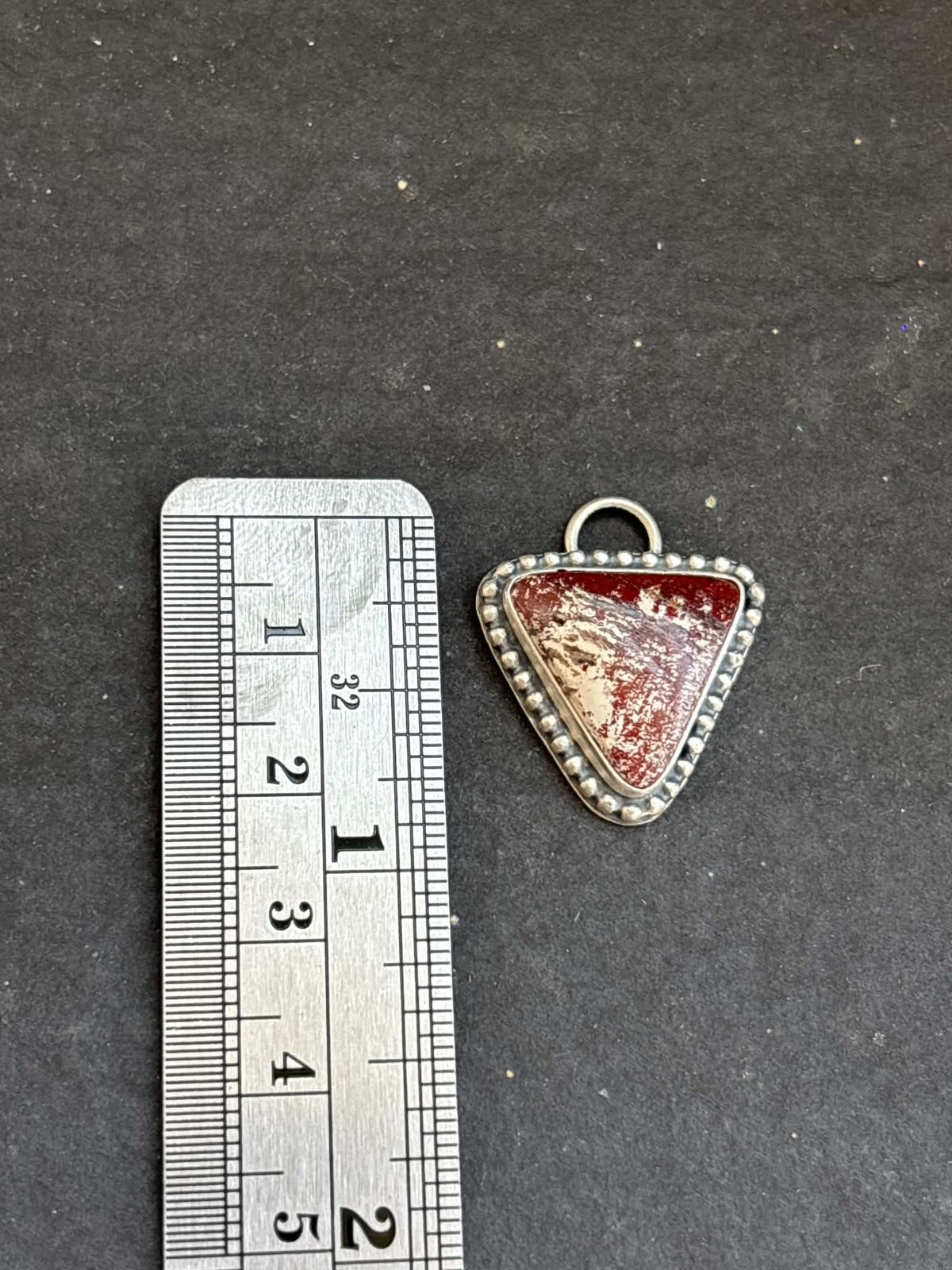 58. Red Buffalo Charm