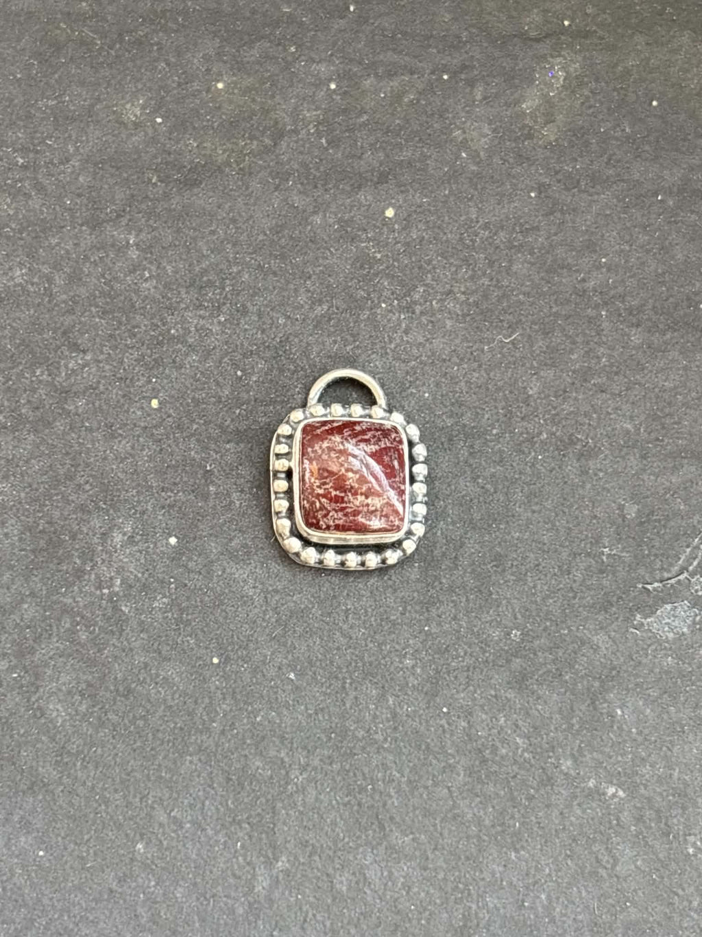 59. Red Buffalo Charm