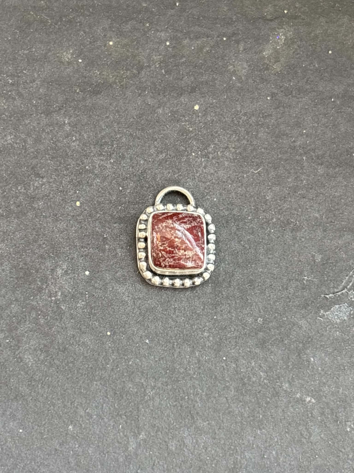 59. Red Buffalo Charm