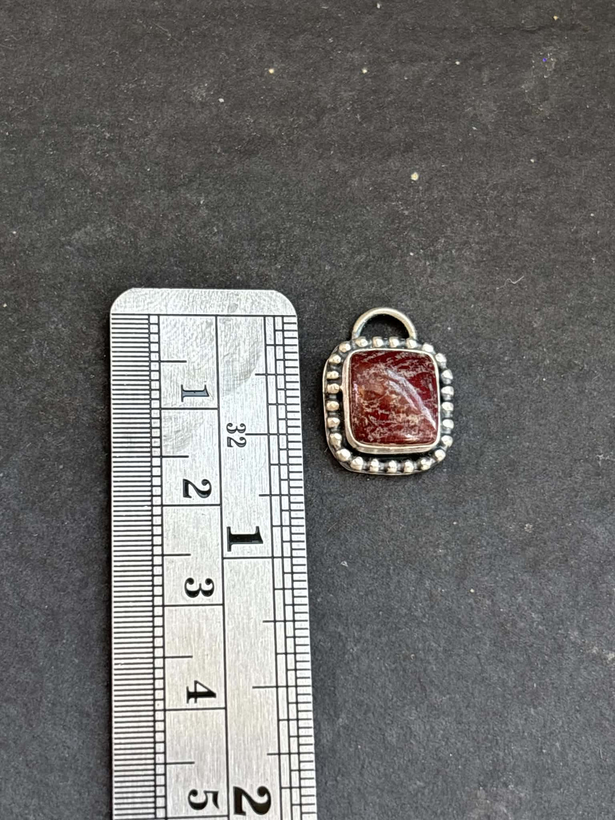 59. Red Buffalo Charm