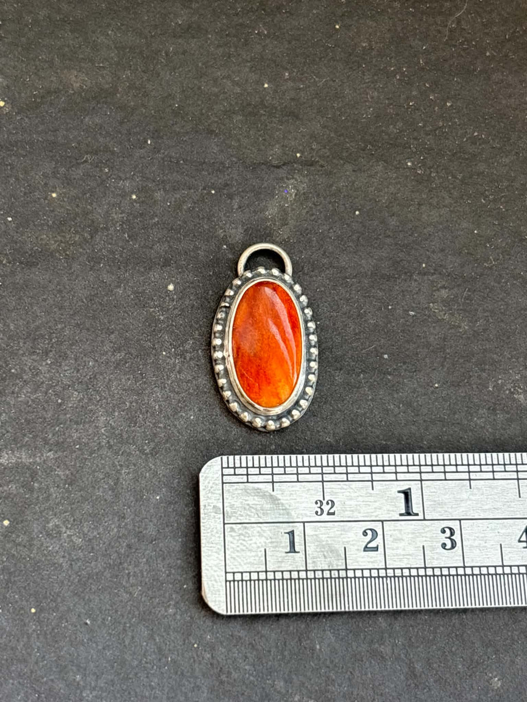 71. Orange Spiny Oyster Charm