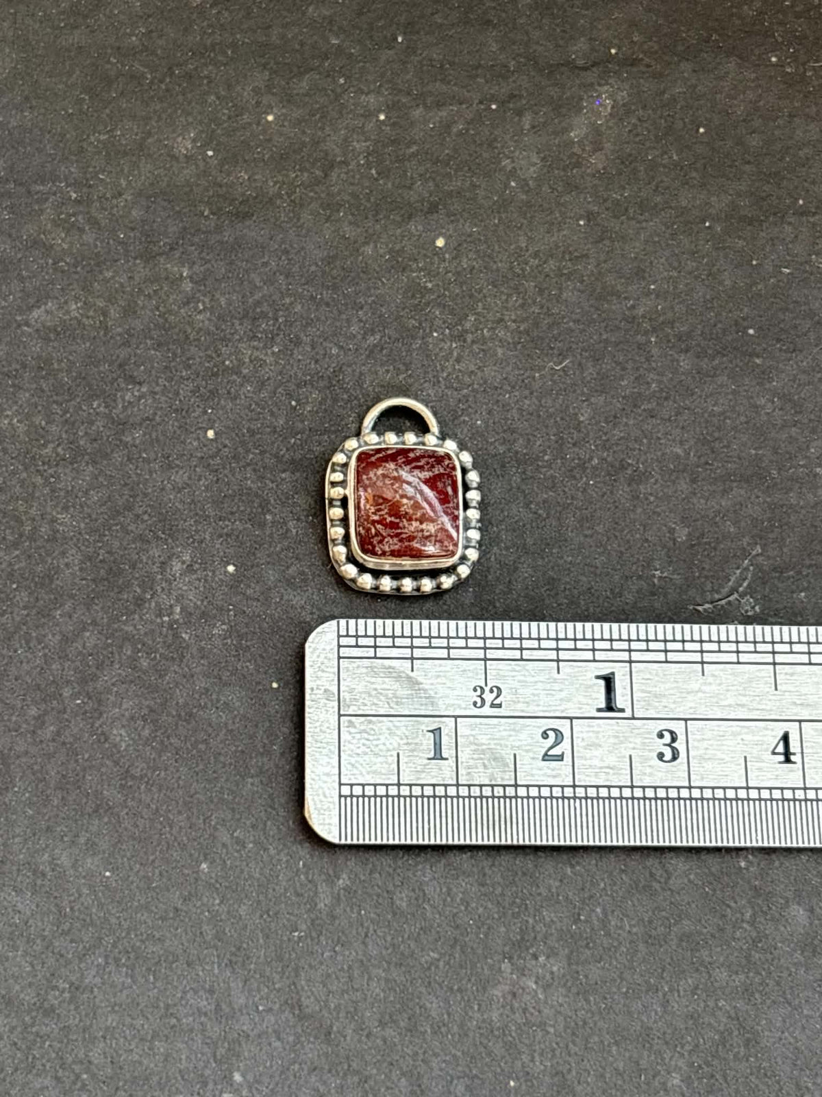 59. Red Buffalo Charm