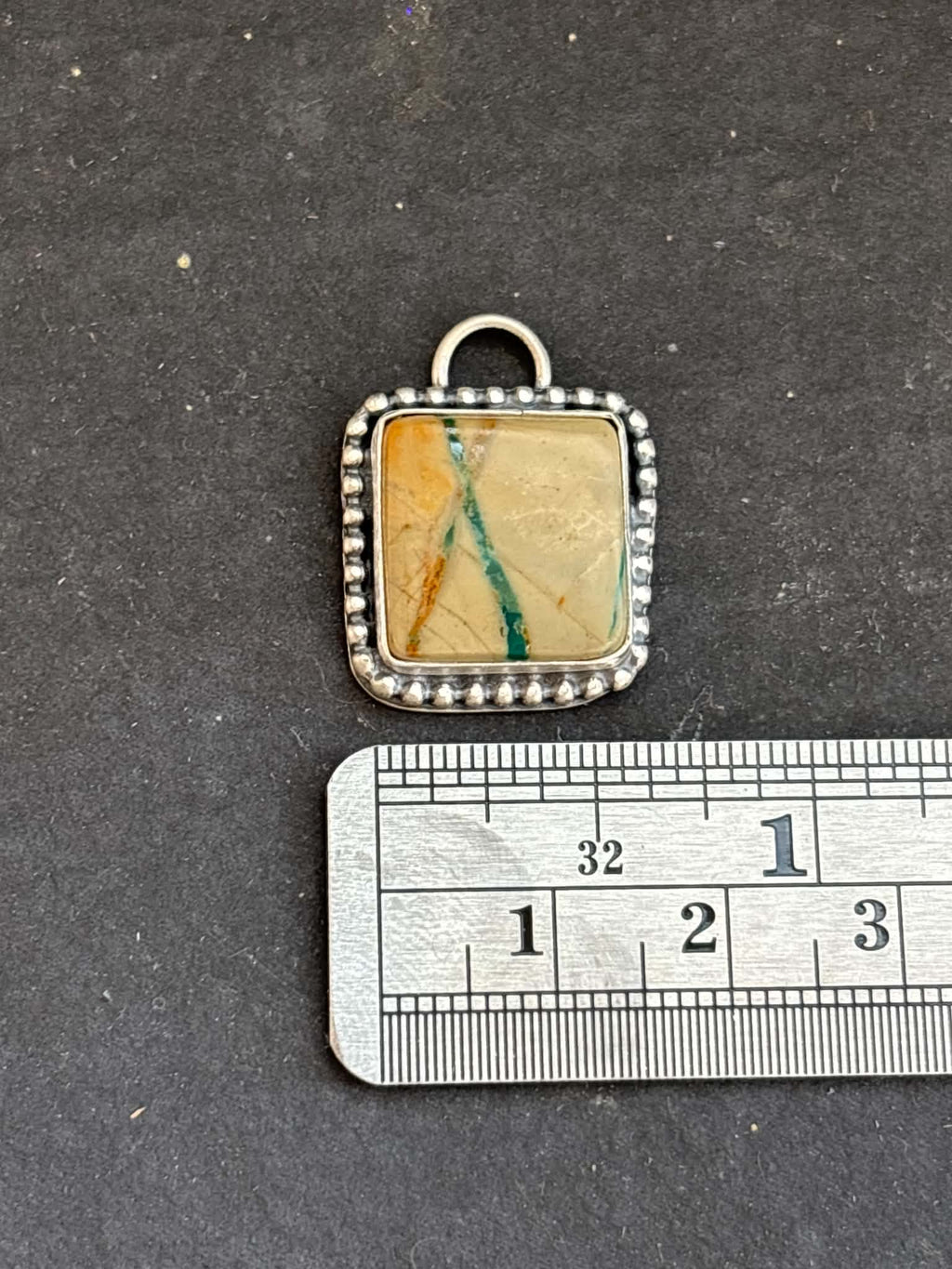 1. Ribbon Royston Turquoise Charm