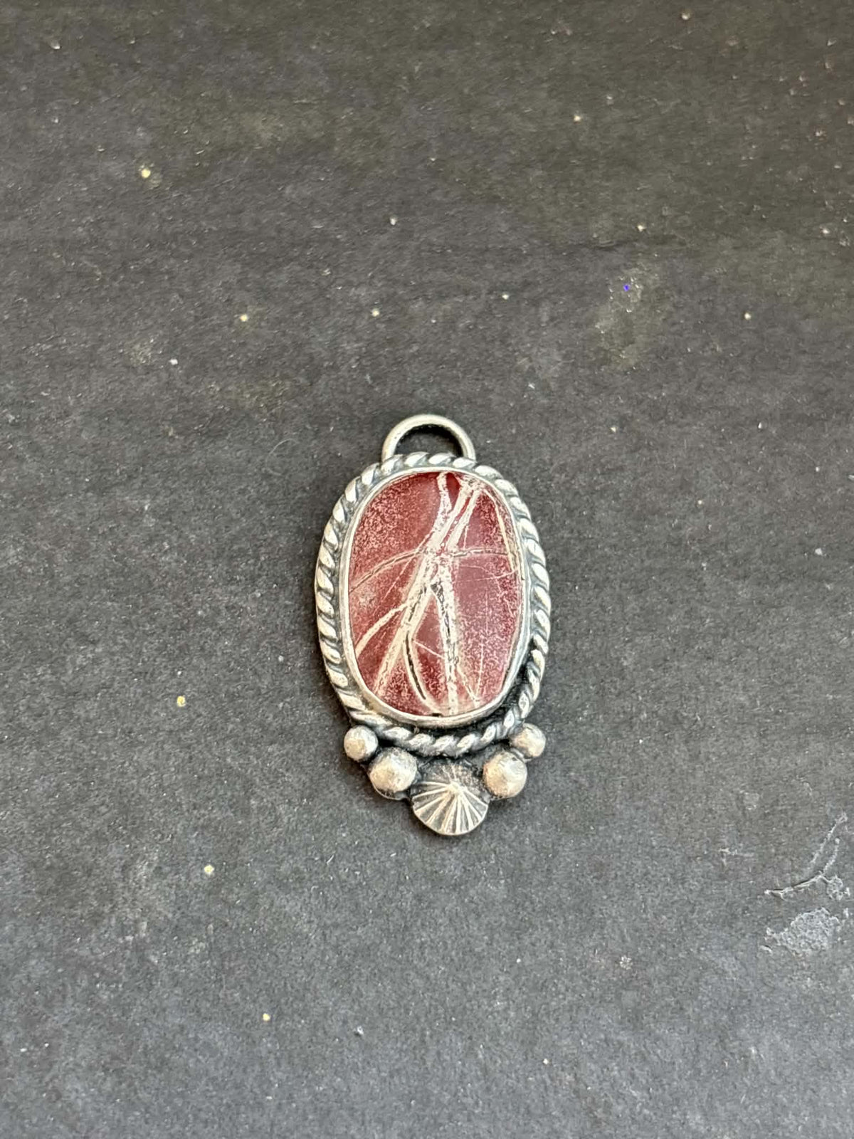 61. Red Buffalo Charm