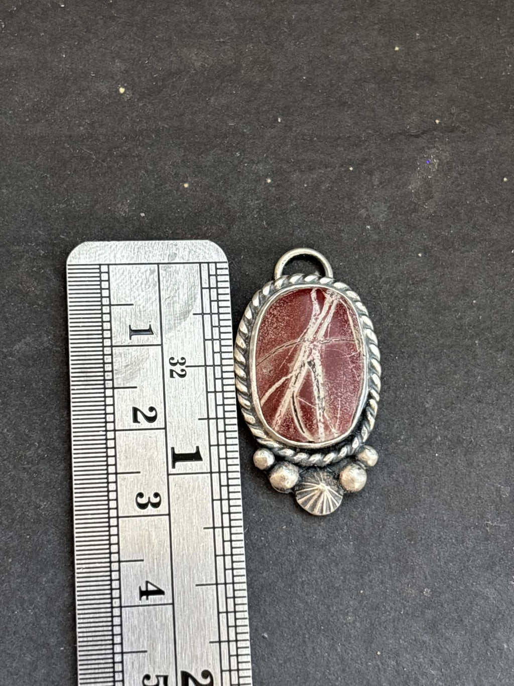 61. Red Buffalo Charm