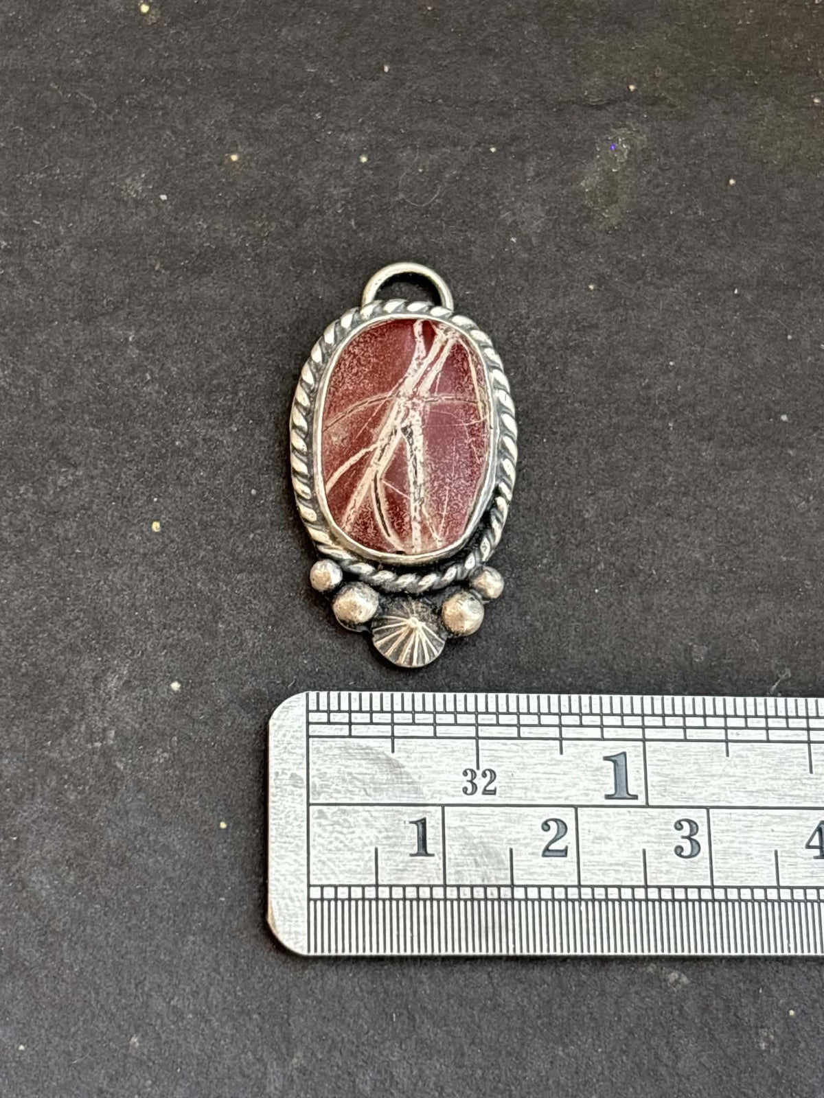61. Red Buffalo Charm