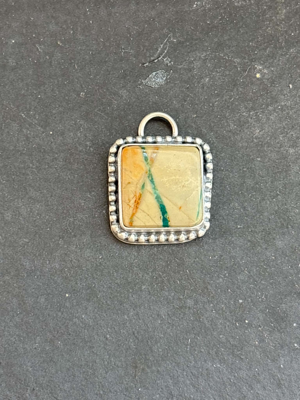 1. Ribbon Royston Turquoise Charm