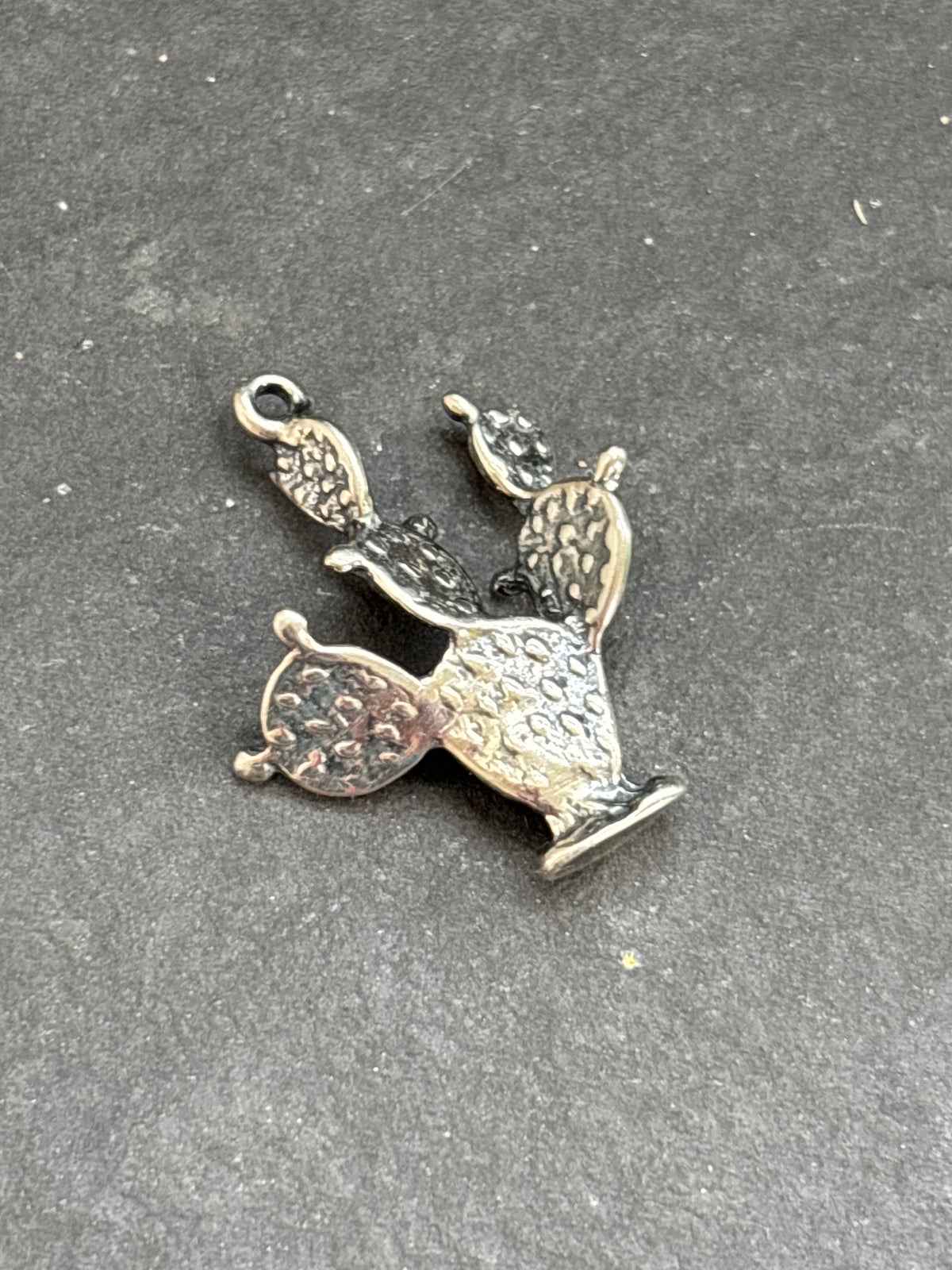 Orange Spiny Oyster Prickly Pear Cactus Charm in sterling silver, back view