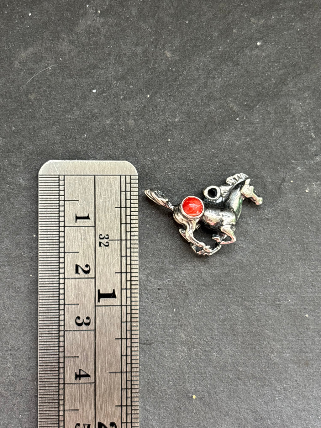 Red Spiny Oyster Galloping Horse Charm
