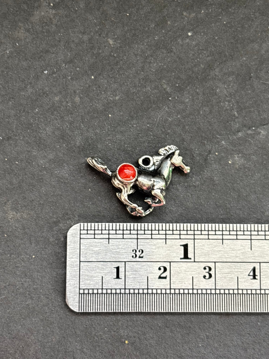 Red Spiny Oyster Galloping Horse Charm