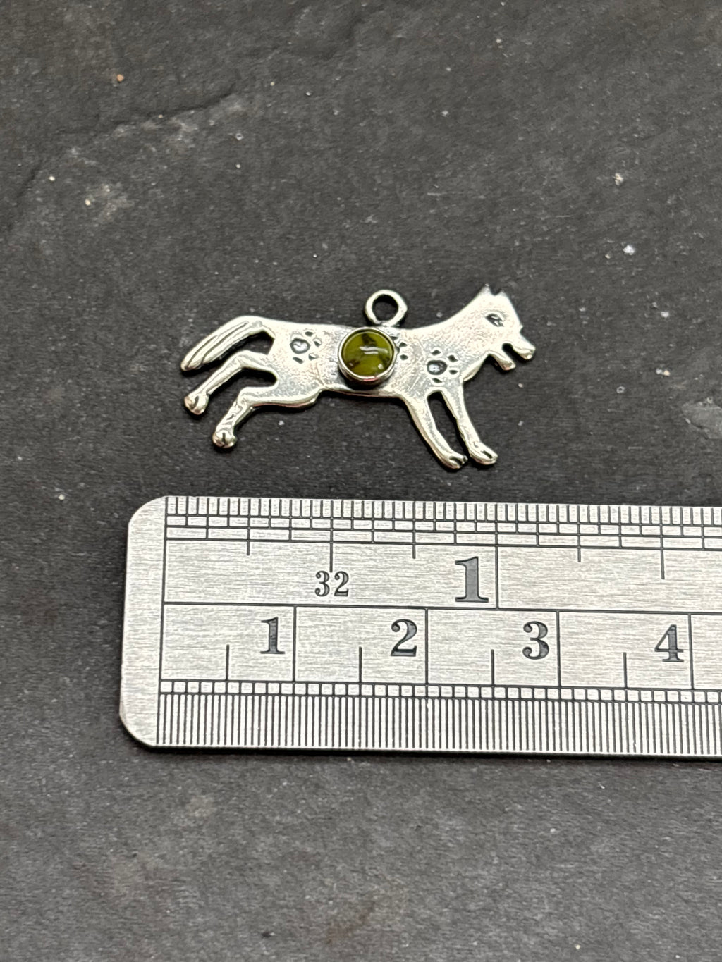 Sonoran Gold Storyteller Wolf Charm