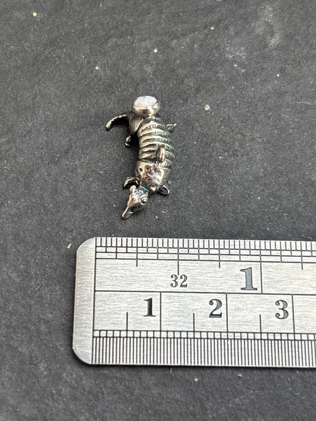 White Buffalo Armadillo Charm