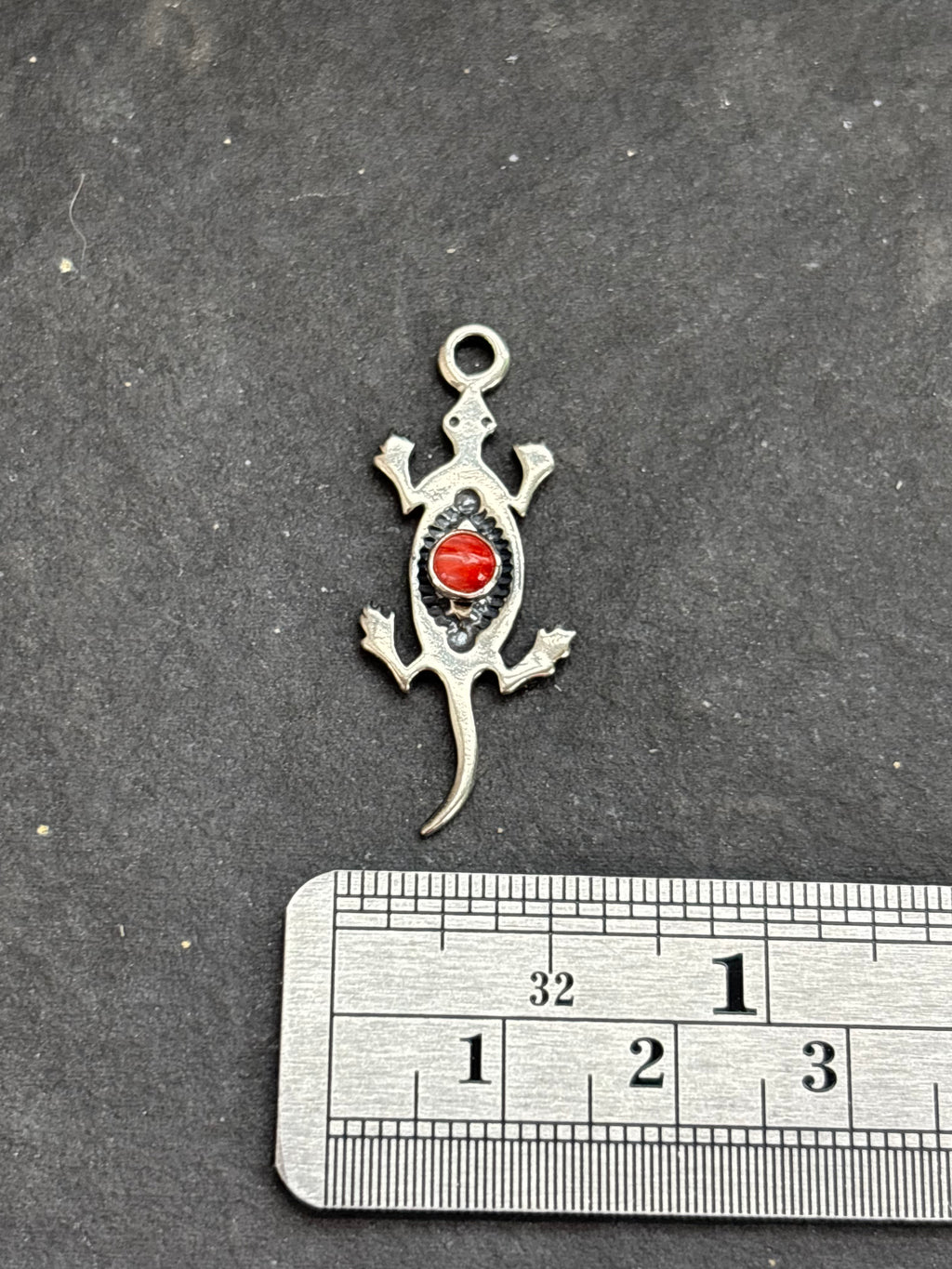 Red Spiny Oyster Storyteller Lizard Charm