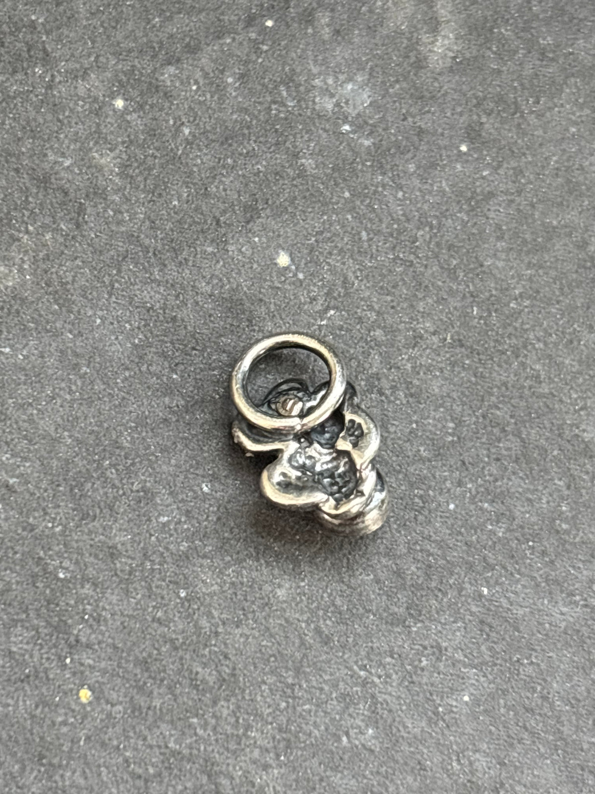 Back of the sterling silver mini cactus charm showing the attached bail.